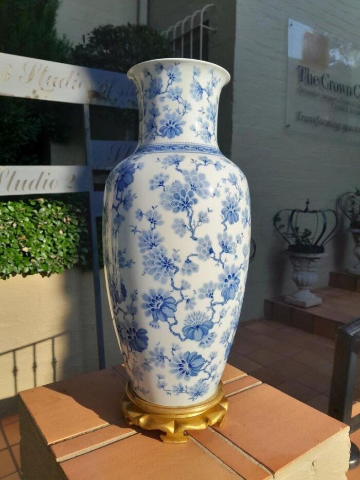 A 20th Century Large Vase On Hand Gilded Wooden Stand