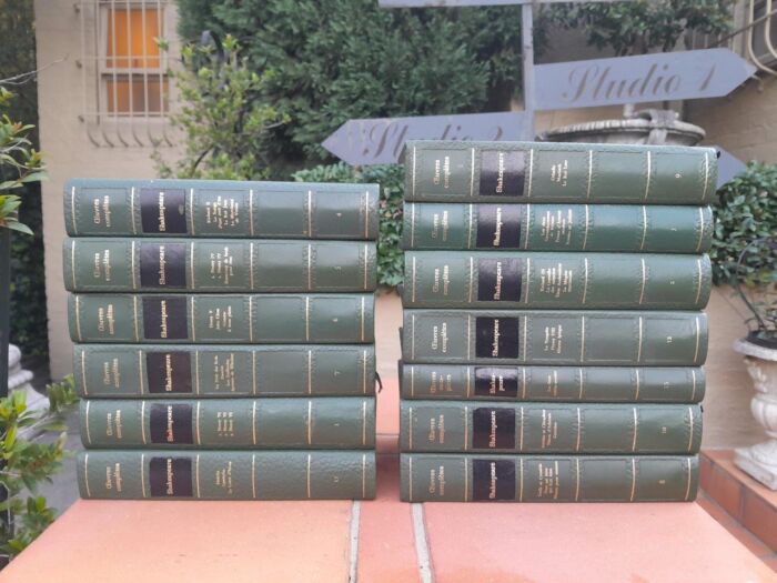 A 20th Century French Set Of Thirteen Volumes Of Shakespeare Covered In Green Leather With Gilded Embossing