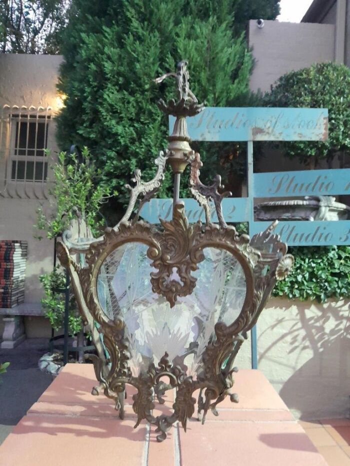 A 20th Century French Ornate Style Brass And Glass Lantern