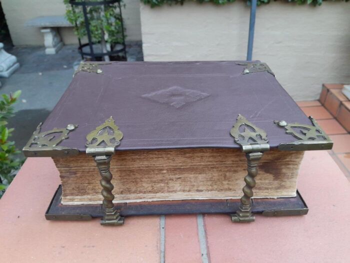 An Early 19th Century Large Leather Bound With Brass Clasps And Mounts Bible