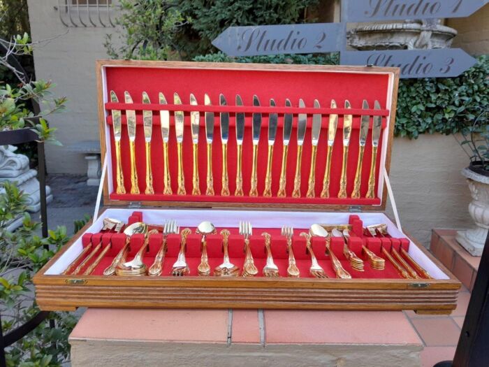 A 20TH Century Gold Plated Cutlery Set In Canteen (112 Pieces)