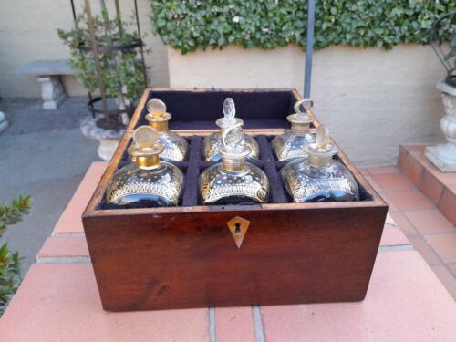 A 20th Century Decanter Velvet Lined Box With Six Decanters And Two Crystal Glasses